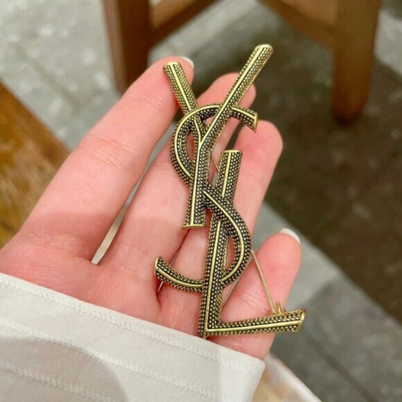 Authentic Yves Saint Laurent logo brooch - Picture 1 of 9